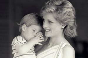 Young Prince Harry tries to hide behind his mother Diana, Princess of Wales