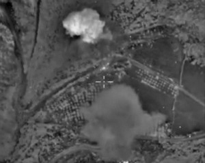 Frame grab taken from footage shows explosion after airstrikes carried out by Russian air force in Idlib province