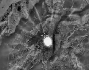 Frame grab taken from footage shows explosion after airstrikes carried out by Russian air force in Hama province