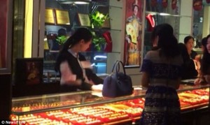 2CF9761D00000578-3256186-Handfuls_of_cash_in_100_Yuan_10_notes_were_thrown_It_s_estimated-a-33_1443710855434