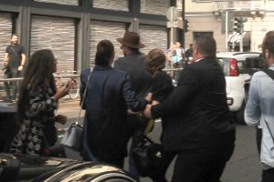 September 21, 2016: Sisters and model Bella Hadid and Gigi Hadid are spotted out and about during Fashion Week in Milan, Italy. Gigi appears to have been involved in an accident with a fan as they both leave a show. Mandatory Credit: INFphoto.com Ref: infswich-02