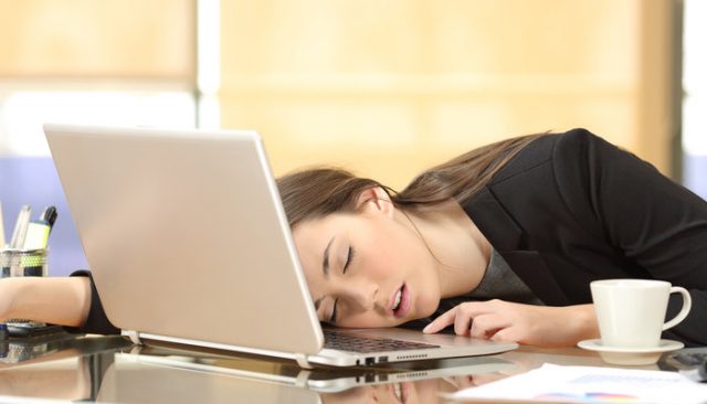 woman-sleeping-at-desk